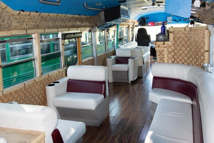 a living area with a building in the background